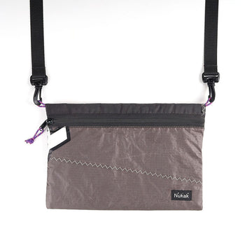 CROS SACOCHE GRIS NEGRO